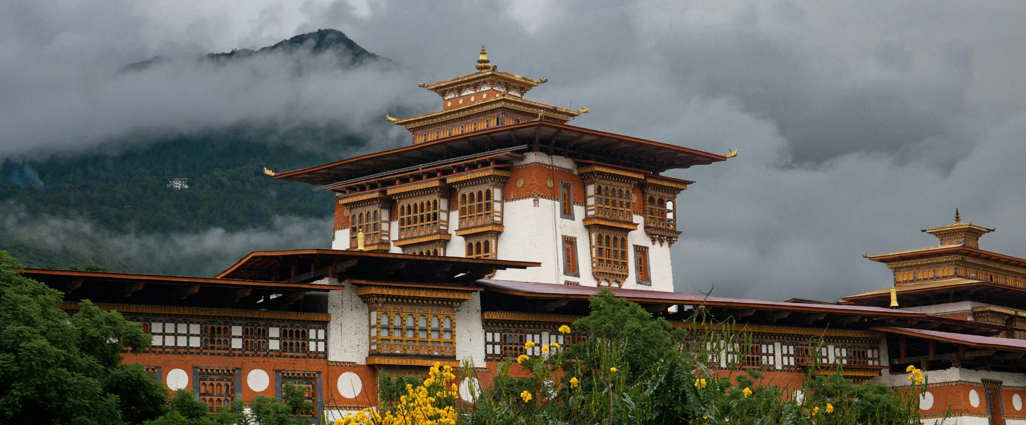 Bhutanese valley and monastery setting for slow-paced activity tours